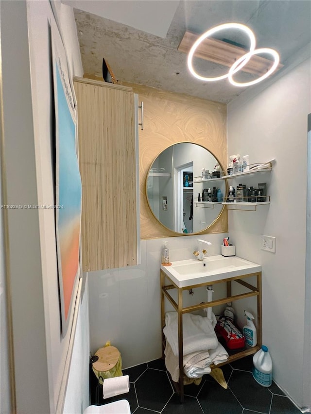 bathroom with tile patterned flooring and vanity