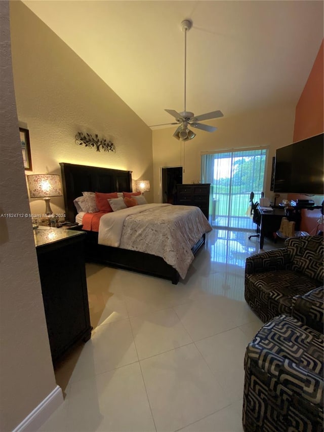 bedroom with vaulted ceiling, access to outside, light tile patterned floors, and ceiling fan