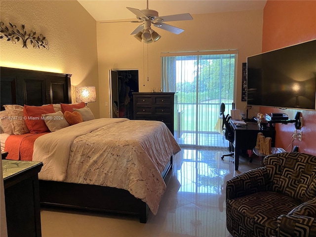 bedroom featuring ceiling fan, access to exterior, and tile patterned flooring