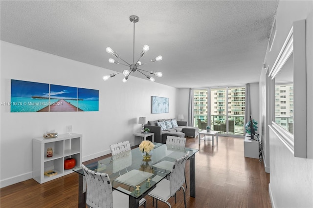 dining area with a notable chandelier, a textured ceiling, dark hardwood / wood-style floors, and floor to ceiling windows