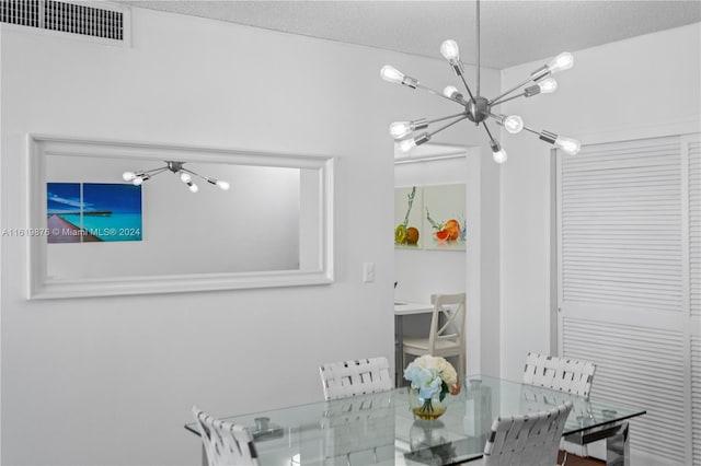 dining area with a textured ceiling