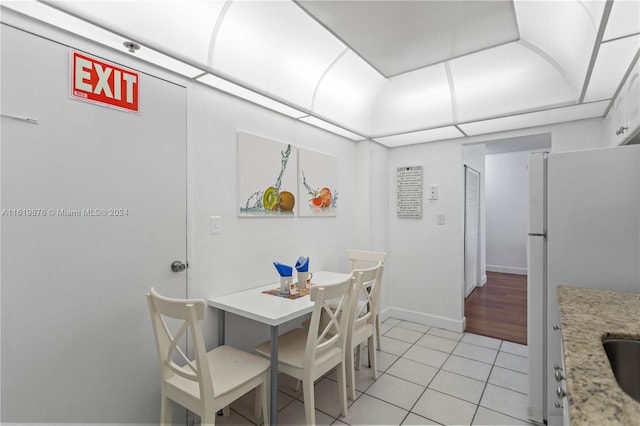 view of tiled dining area