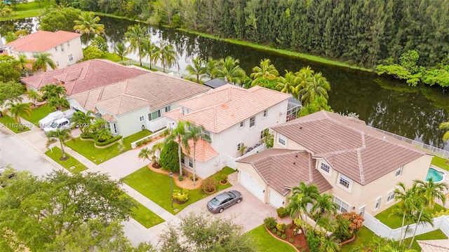 aerial view with a water view and a residential view