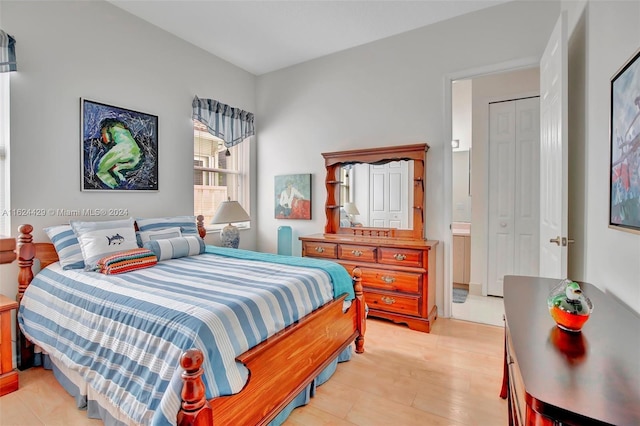 bedroom featuring light wood-type flooring