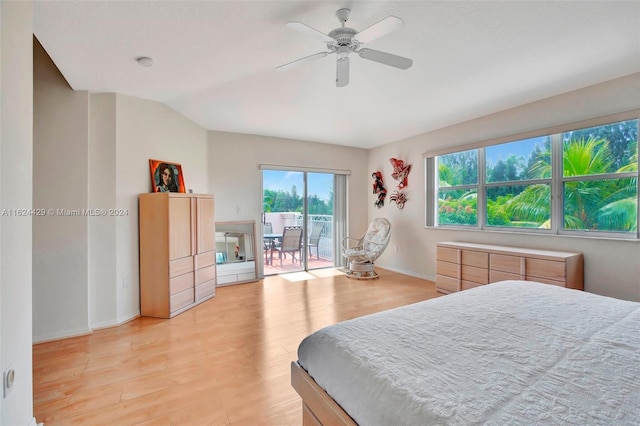 bedroom with light wood-type flooring, lofted ceiling, access to exterior, baseboards, and ceiling fan