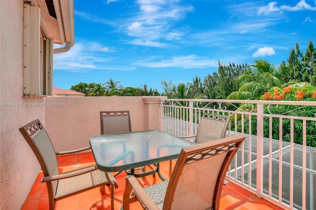 balcony featuring outdoor dining space