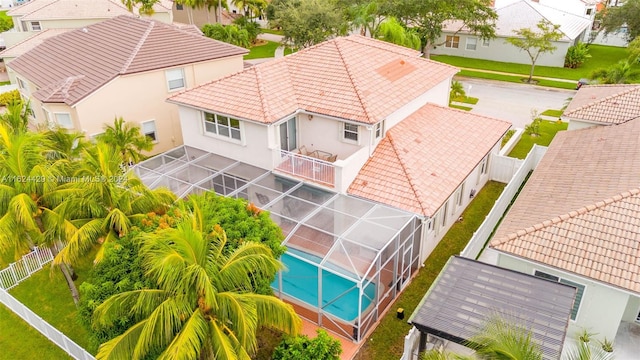 birds eye view of property with a residential view