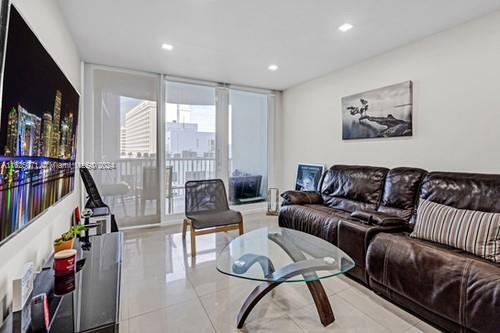 living room featuring light tile patterned floors