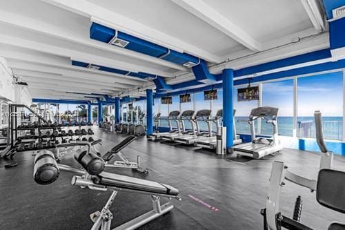 gym with a water view