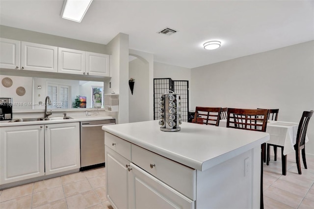 foyer with french doors and light tile patterned floors