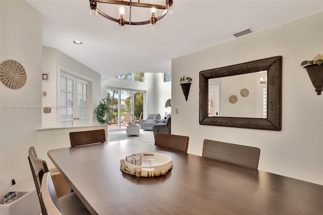 carpeted office space featuring a water view and ceiling fan