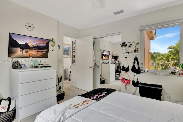 kitchen featuring sink, stainless steel dishwasher, white cabinets, and light tile patterned floors