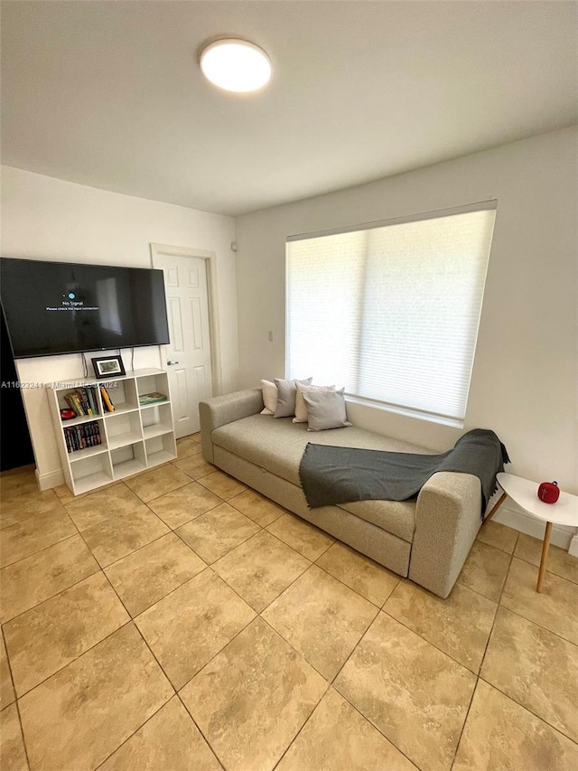 living room with light tile patterned floors