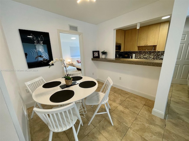 view of tiled dining area