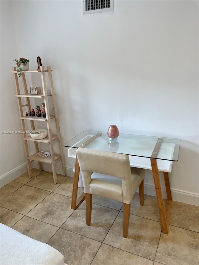 view of tiled dining space