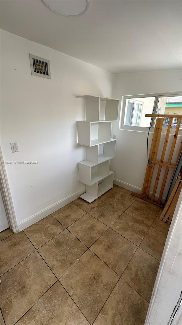 interior space with tile patterned flooring