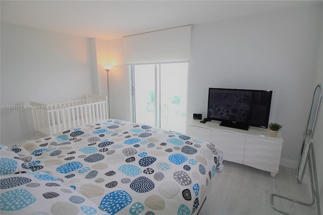 bedroom featuring light hardwood / wood-style floors