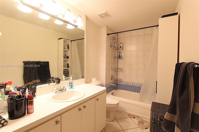 full bathroom with toilet, a textured ceiling, tile patterned floors, shower / bath combo, and vanity