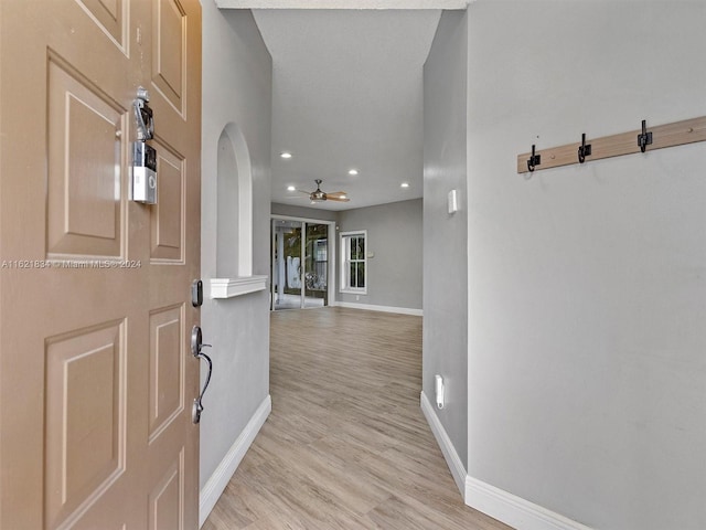 entrance foyer featuring light hardwood / wood-style flooring and ceiling fan