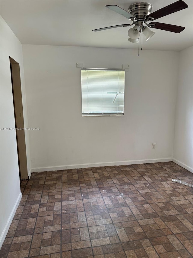 spare room featuring ceiling fan