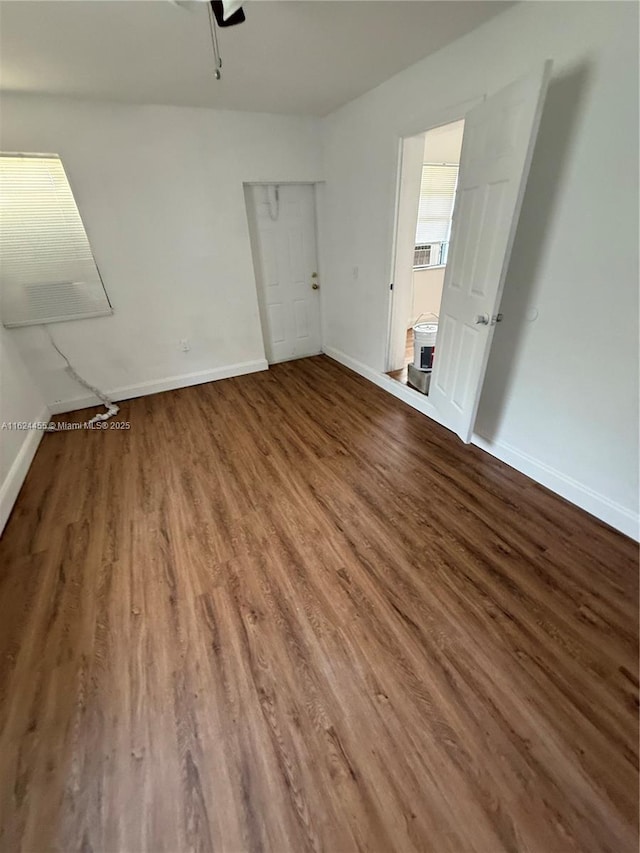 interior space with hardwood / wood-style flooring and ceiling fan