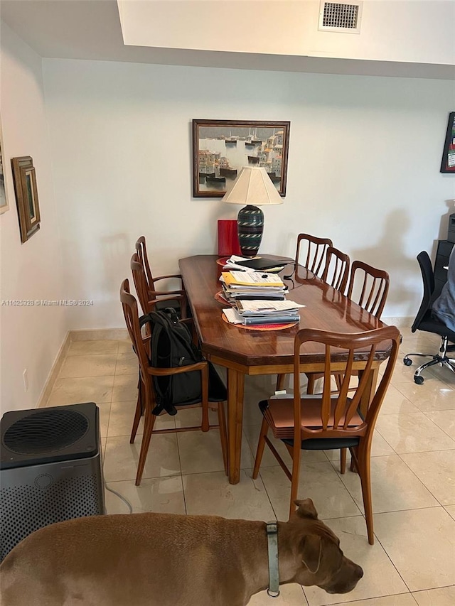 view of tiled dining space