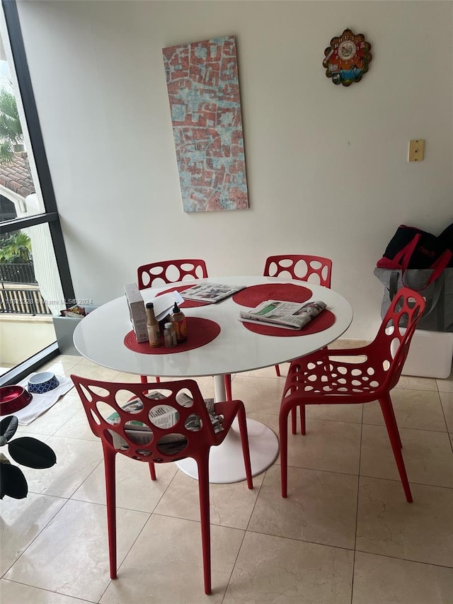 dining room featuring light tile patterned floors