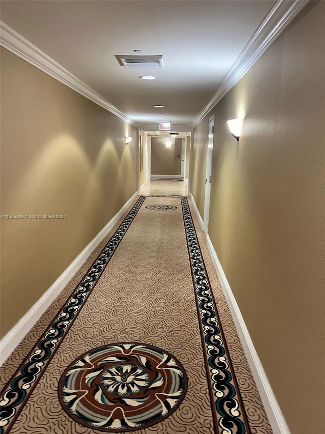 hallway featuring ornamental molding