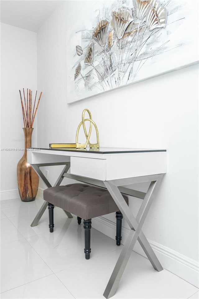 dining space with tile patterned floors