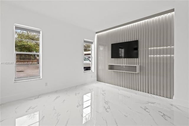 unfurnished room featuring tile patterned flooring