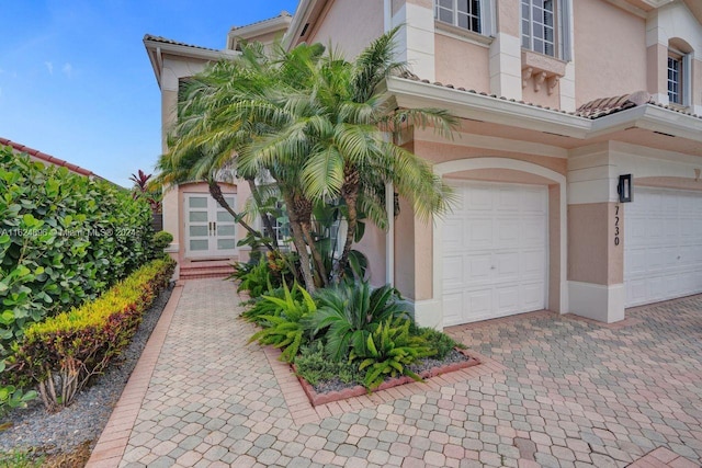 exterior space with a garage