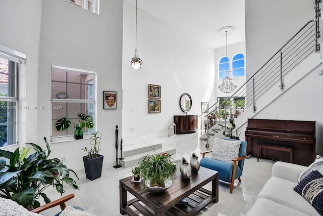 tiled living room featuring a high ceiling