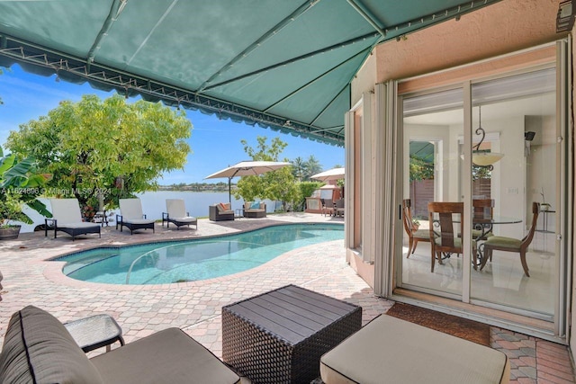 view of pool with a patio area