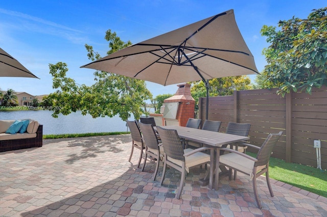 view of patio / terrace featuring a water view