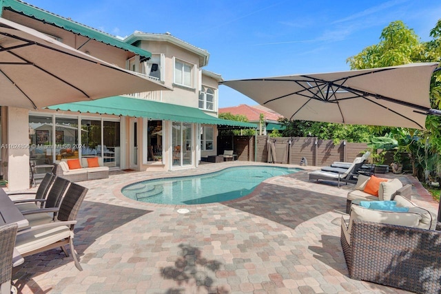 view of pool featuring a patio