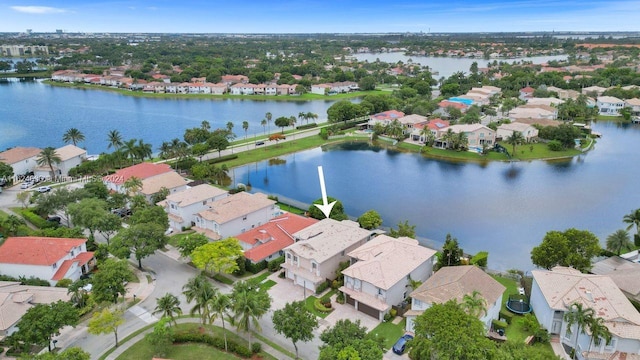 drone / aerial view featuring a water view