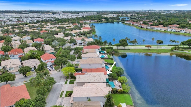 drone / aerial view with a water view