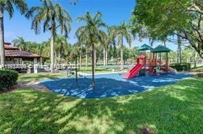 view of playground featuring a lawn