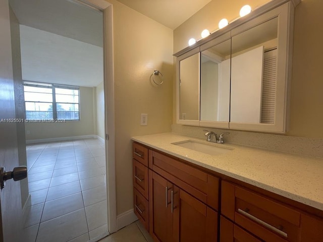 bathroom featuring vanity and tile patterned flooring