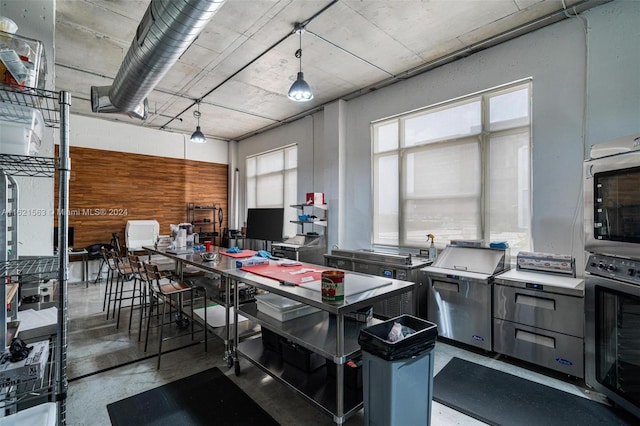 kitchen featuring concrete flooring