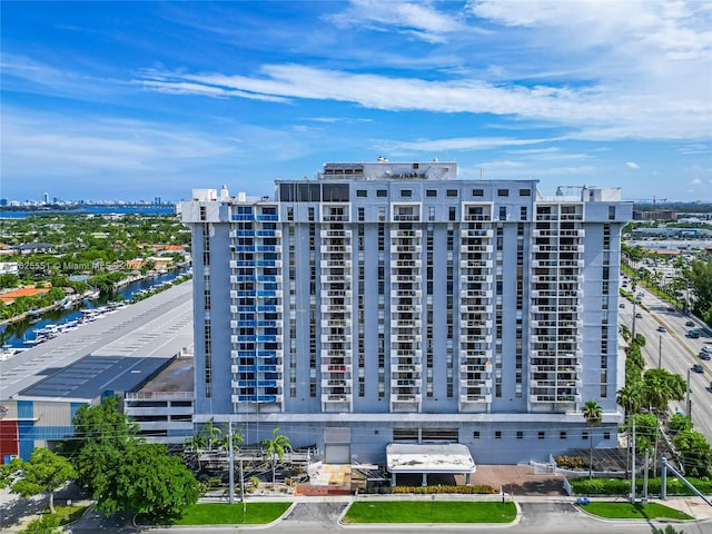 view of building exterior with a water view