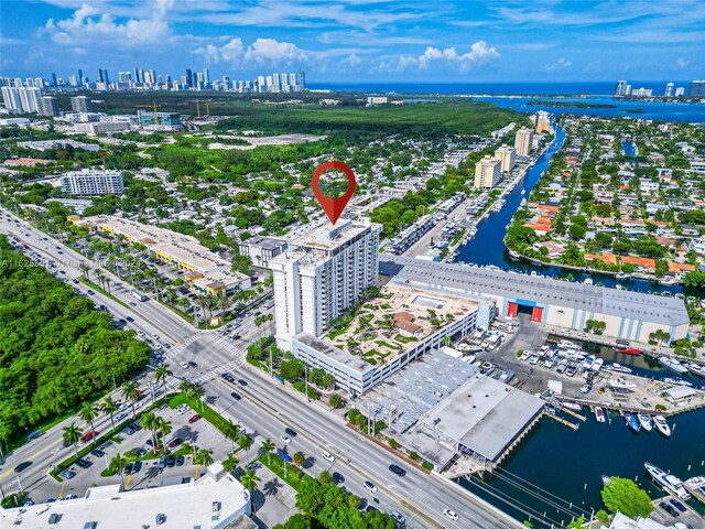 drone / aerial view featuring a water view