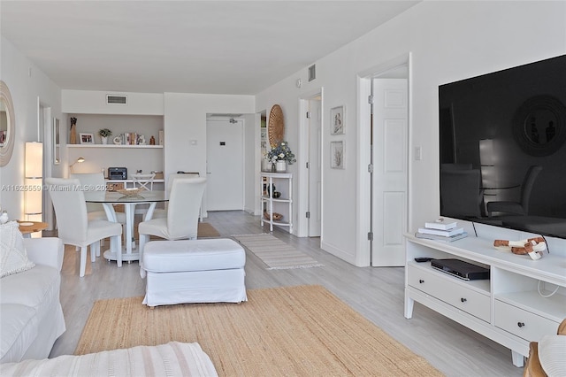 living room featuring light hardwood / wood-style flooring