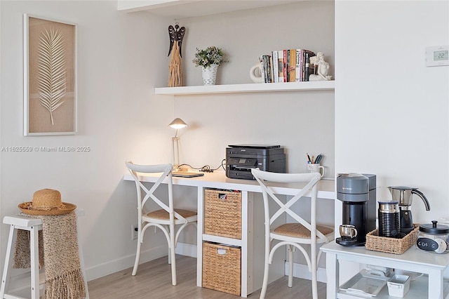 home office featuring hardwood / wood-style floors