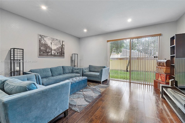 living room with dark wood-type flooring