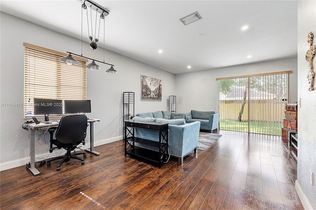 living room featuring dark hardwood / wood-style flooring