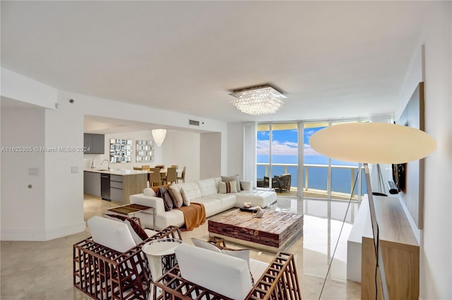 interior space with sink, an inviting chandelier, and floor to ceiling windows