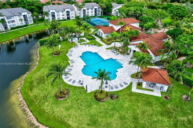 birds eye view of property featuring a water view