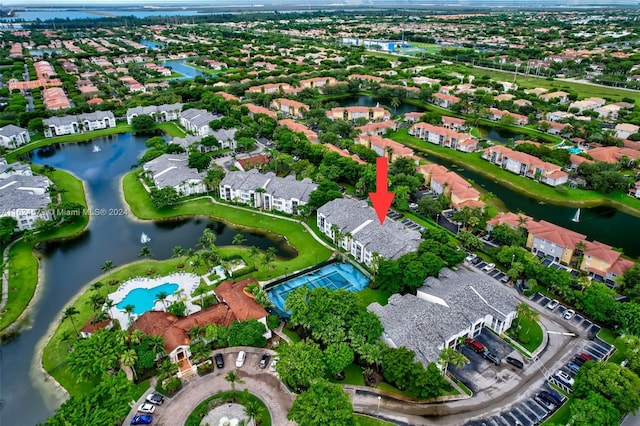 bird's eye view with a water view