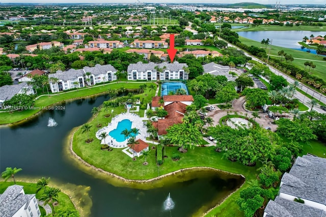 birds eye view of property featuring a water view